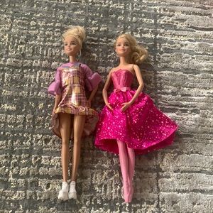 2 Barbie dolls